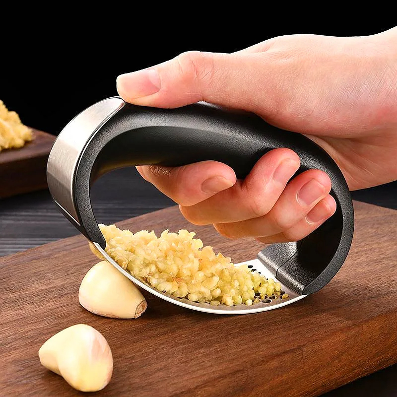 Efficient Stainless Steel Garlic Press Effortlessly Crush and Mince Garlic for Flavorful Dishes